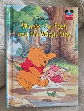 Disney Winnie the Pooh and the Windy Day Hardcover – Yellow, Red, Pink, Green